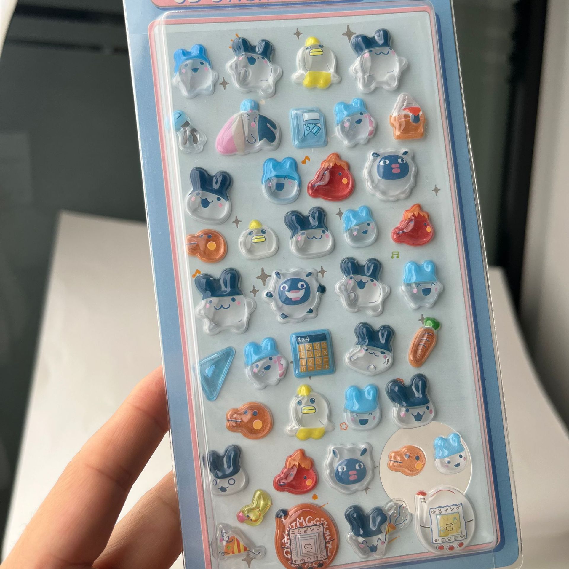 Cute Tamagotchi 3D Puffy Stick - Phone Accessories And Electronics recension och pris